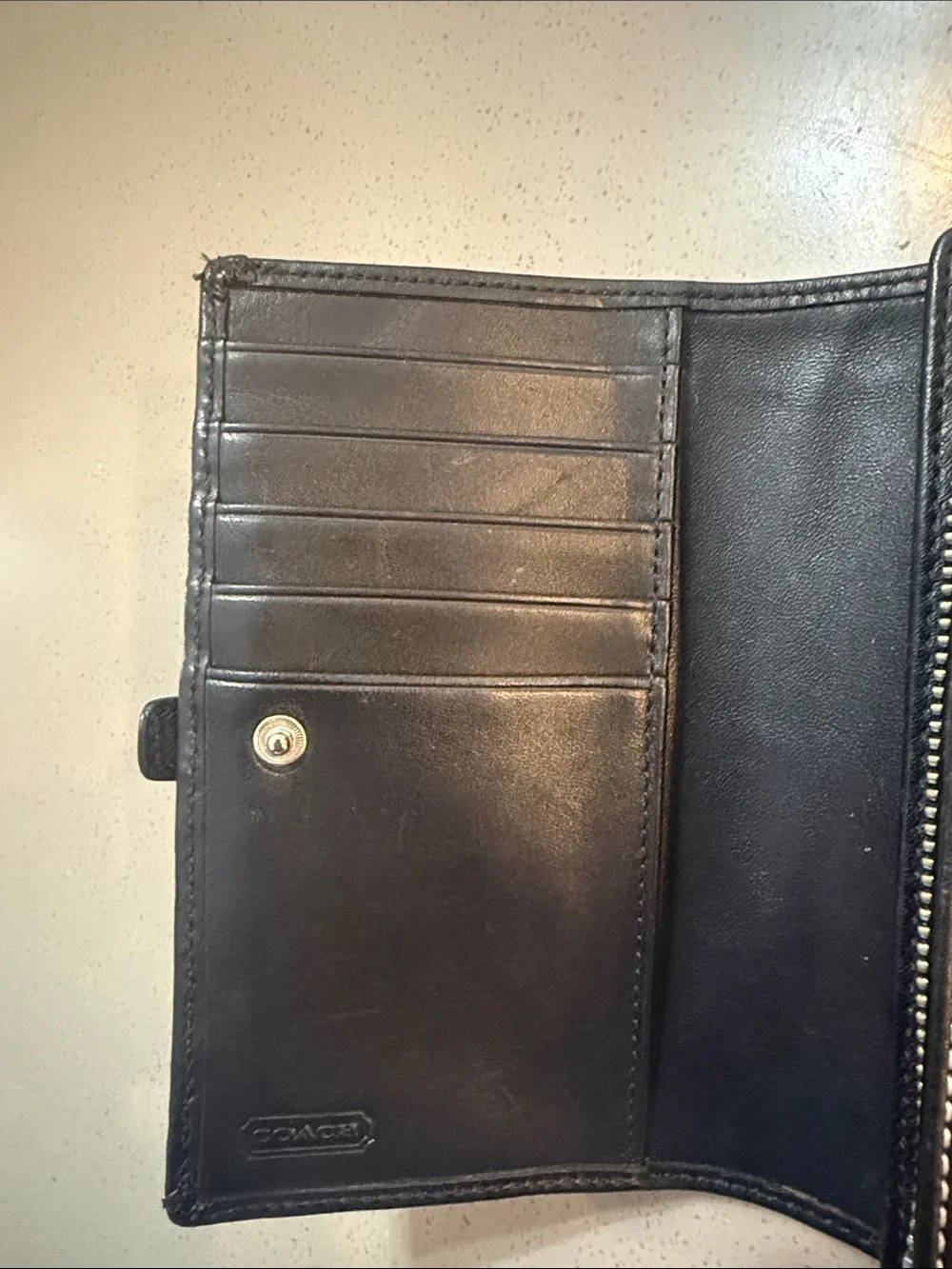 Coach Black Leather Wallet with White Stitching and Buckle